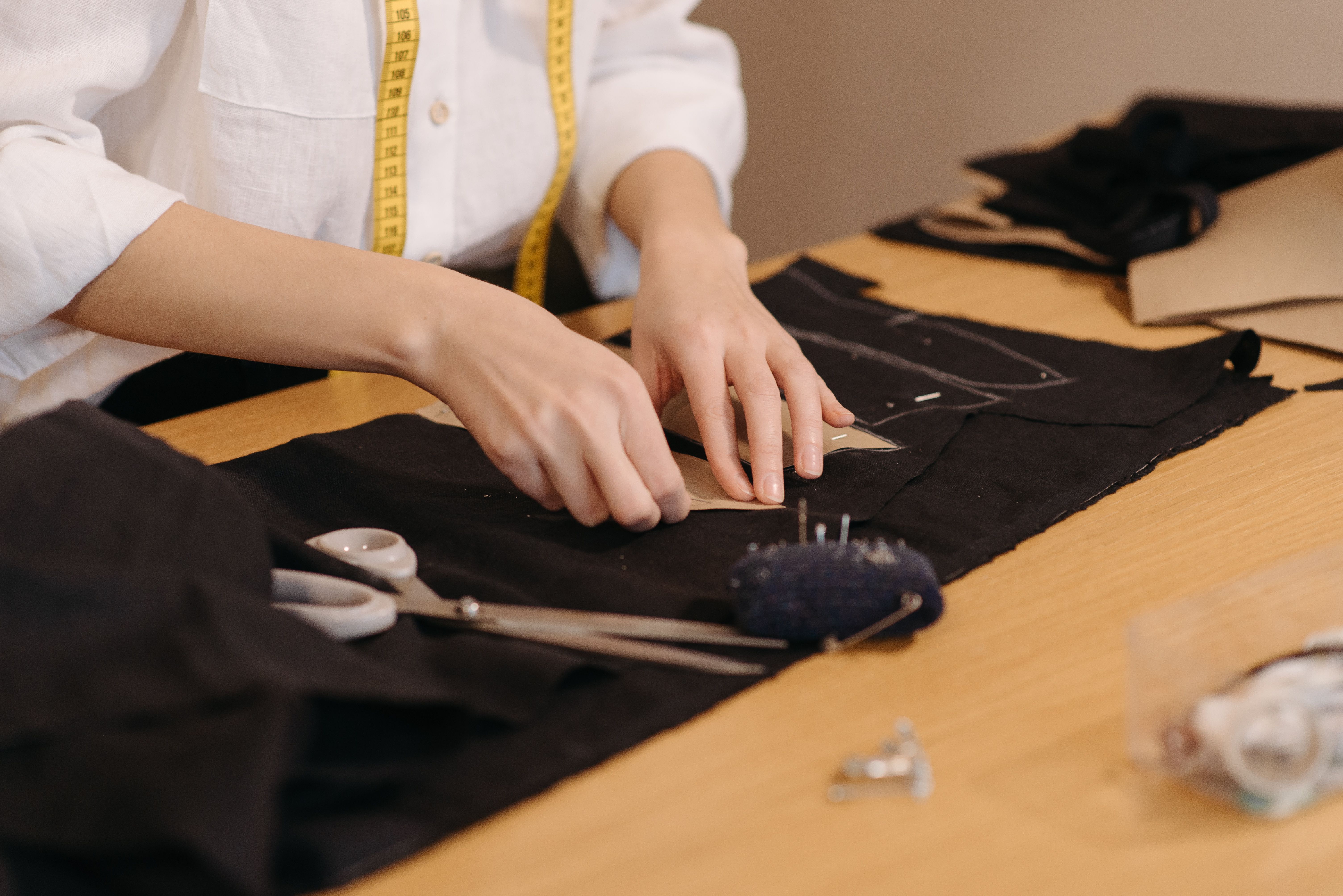 Master Tailor Measuring Luxury Cloth